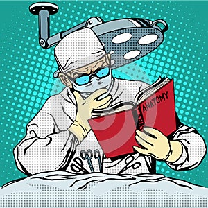 The surgeon before surgery is reading anatomy