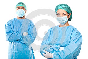 Surgeon team in protective uniforms photo