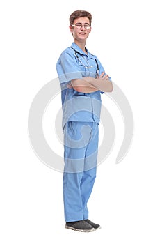 Surgeon wearing blue uniform with stethoscope standing with folded arms
