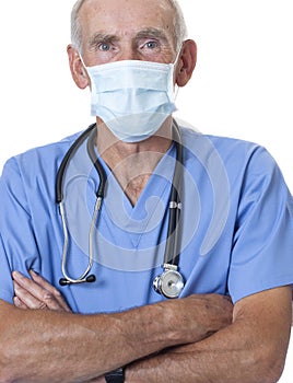 Surgeon wearing scrubs and face mask