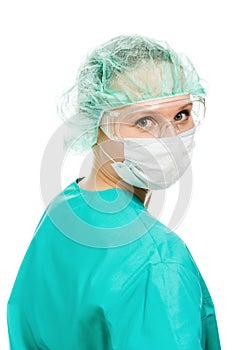 Surgeon woman in protective glasses and mask