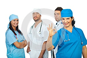 Surgeon woman showing okay sign