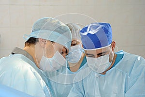 Surgeons do the operation.