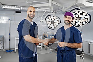 Surgeons Handshake in Operating Room