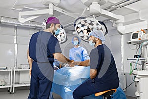 Surgeons Handshake in Operating Room