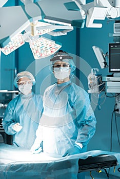 surgeons in medical mask looking