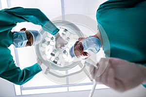 Surgeons operating in operation theater