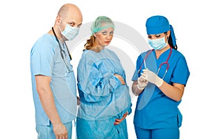 Surgeons with pregnant prepare anesthesia