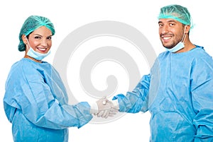 Surgeons team handshake