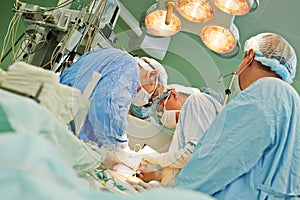 Surgeons team at operation