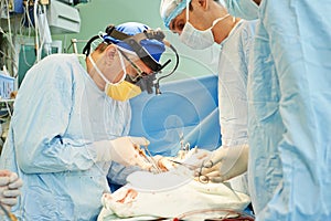 Surgeons team at operation