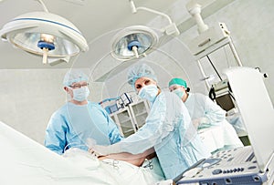 Surgeons team at surgery operation