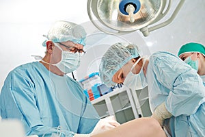 Surgeons team at surgery operation