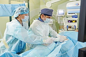 Surgeons team at vascular surgery operation