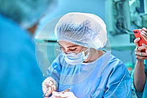 Surgeons team working in the hospital, operating room