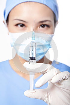 Surgery doctor with syringe needle