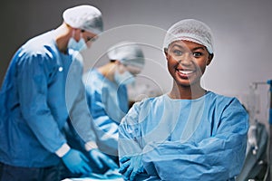 Surgery, portrait and black woman doctor in theater for hospital teamwork, leadership and medical internship. Happy