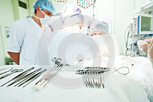 Surgery and surgical tools at surgion operation in hospital photo