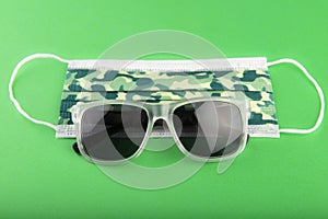 Surgical camo facemask and sunglasses