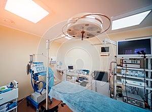 Surgical equipment and medical devices in operating room.