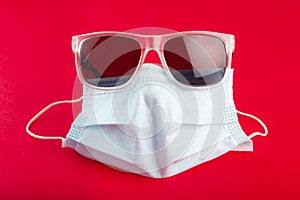 Surgical facmask and sunglasses for protection to covid 19 coronavirus