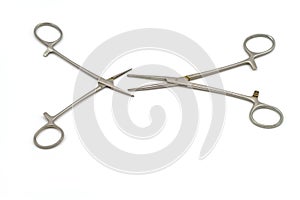 Surgical instrument (hemostat or artery clamp ) on white background