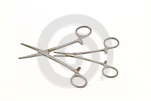 Surgical instrument (hemostat or artery clamp ) on white background