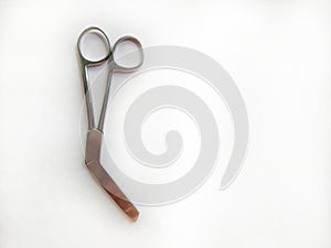 Surgical instrument on white background. Episiotomy Scissor.