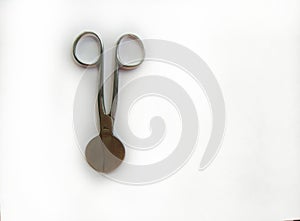 Surgical instrument on white background. Umbilical cord cutting scissor.