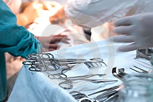 surgical instruments on a sterile table, in the operating room