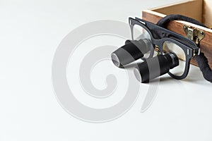 Surgical loupes on white background