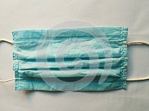 Surgical mask protect us from communicable disease. It is used by doctor and common people. photo