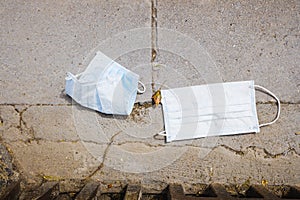 Surgical masks dumped as garbage on the street by coronavirus bystanders