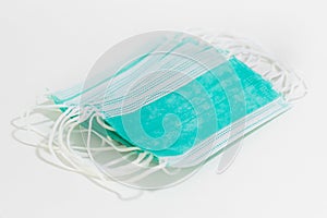 Surgical masks prevent transmission of body fluids from the wearer to others.