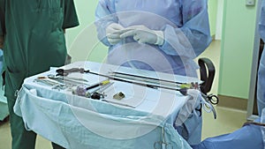 Surgical nurse preparing instrument for operation