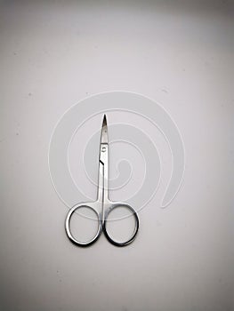 Surgical scissors isolated on a white background, close-up