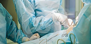 Surgical team performing surgery in hospital operating room