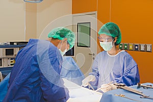 The surgical team is performing surgery for the patients in the operating room