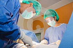 The surgical team is performing surgery for the patients in the operating room
