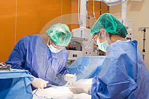 The surgical team is performing surgery for the patients in the operating room