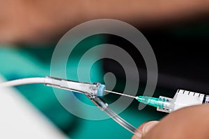 Surgical team preparing their patient for surgery, anesthesiologist gives anesthesia to a patient photo