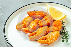 Surimi crab with lenon on plate, Food recipe background. Close up photo
