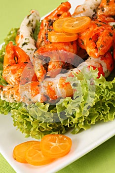 Surimi salad with kumquat photo