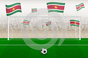 Suriname football team fans with flags of Suriname cheering on stadium, penalty kick concept in a soccer match