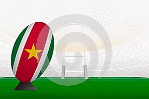 Suriname national team rugby ball on rugby stadium and goal posts, preparing for a penalty or free kick