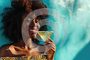 Surprise African Yearold Woman Sipping A Martini On Turquoise Background photo