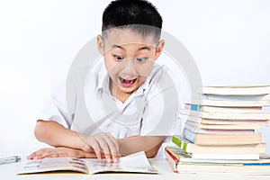 Surprise Asian Chinese Little Boy Wearing Student Uniform Reading Textbook