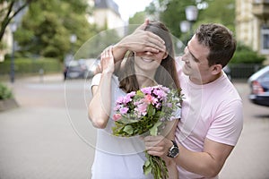 Surprise with bouquet of flowers