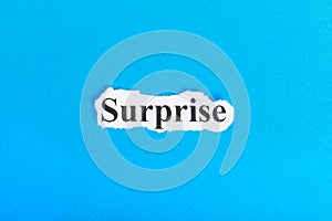 Surprise text on paper. Word Surprise on torn paper. Concept Image photo