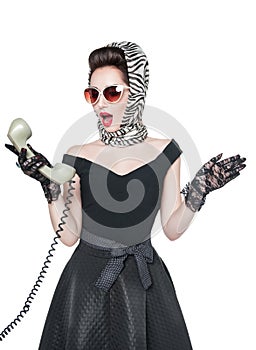 Surprised beautiful woman in pin-up style with retro telephone i